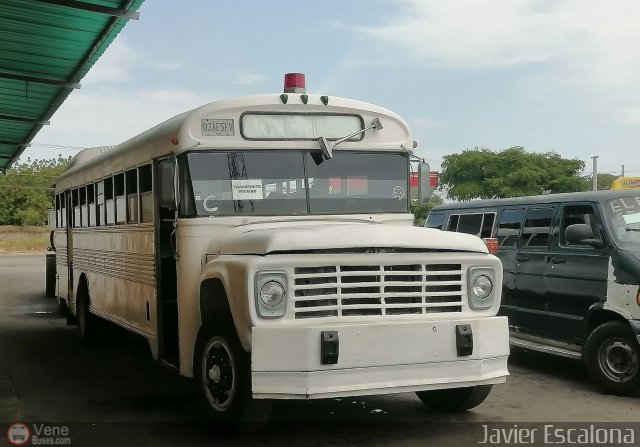 Particular o Desconocido 0021 por Numiskar Escalona